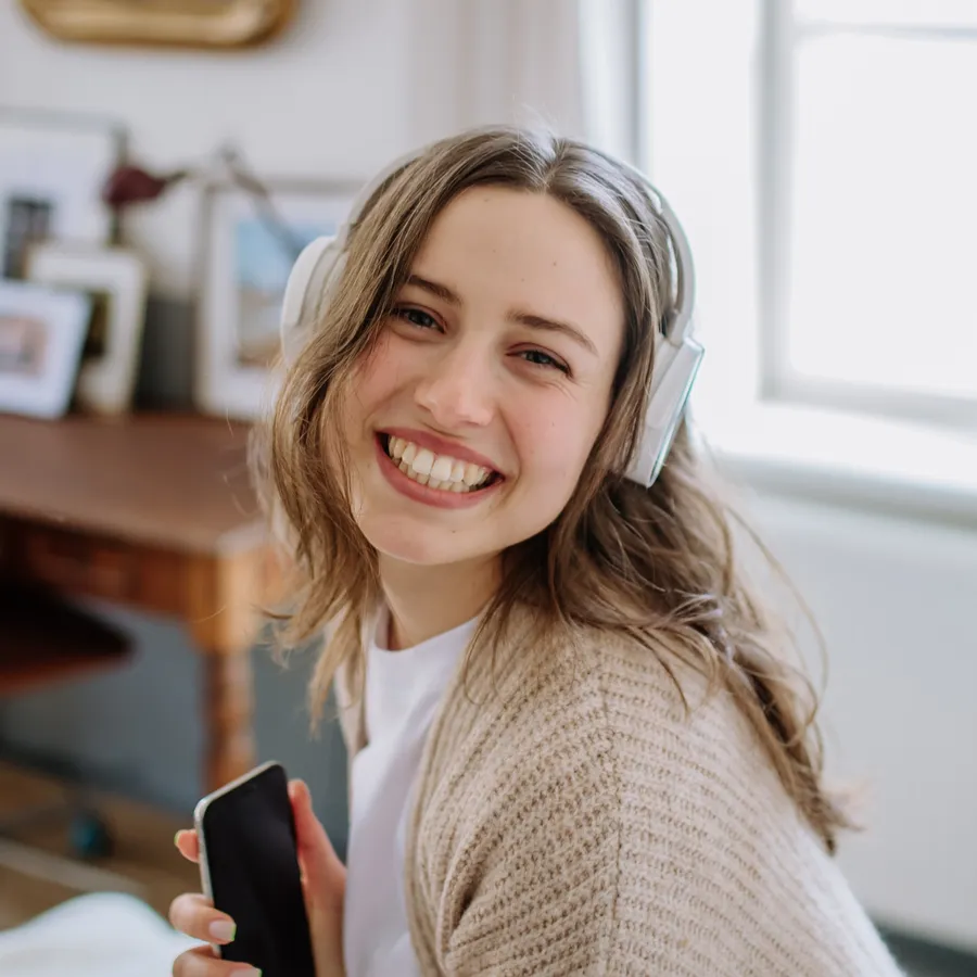 Young woman smiling with straight teeth